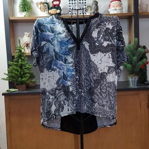 Woman's blue and black top